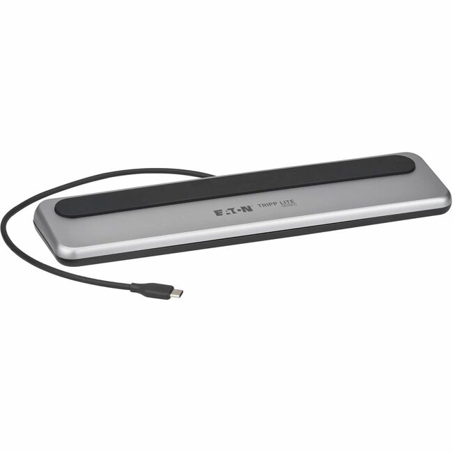 Eaton U442-DOCK7D-2 Tripp Lite docking station with multiple ports, connected to a laptop on a desk setup.